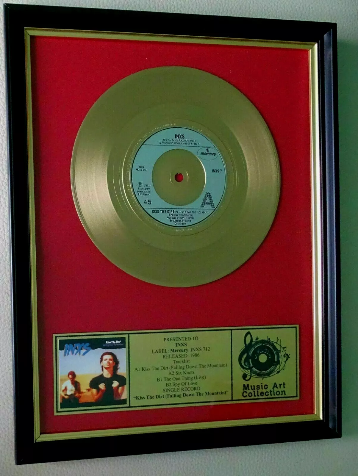 INXS – "Kiss the Dirt (Falling Down the Mountain)" Disc replică auriu